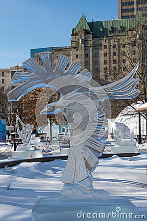 Crow eagle ice sculpture at Ottawa`s Winterlude Editorial Stock Photo