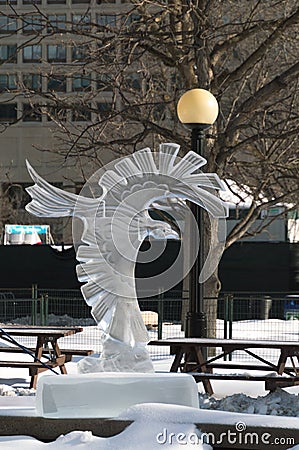 Crow eagle ice sculpture at Ottawa`s Winterlude Editorial Stock Photo