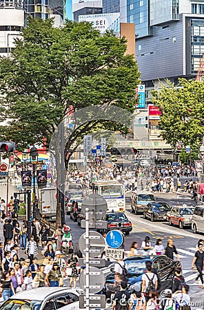 TOKYO, JAPAN - August 21 2018: Crowd crossing at the pedestrian crossing of the Crossing Intersection Editorial Stock Photo