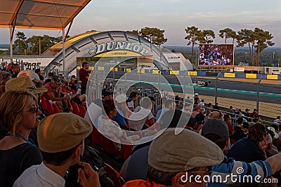 Crowd at the Dunlop bridge on Le Mans track Editorial Stock Photo