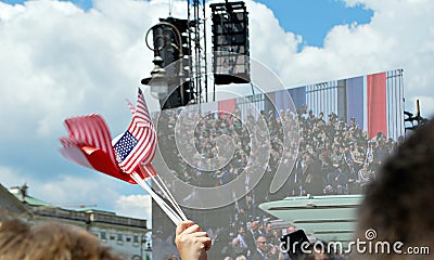 Crowd enthusiastically wave flags. Krasinski Square. Editorial Stock Photo