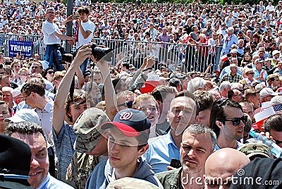 Crowd enthusiastically wave flags Editorial Stock Photo