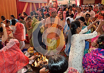 Crowd gathers in Havan pooja during Navami of Durga Pooja Festival Editorial Stock Photo