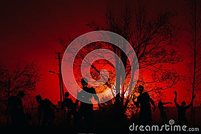 Crowd of hungry zombies in the woods Stock Photo