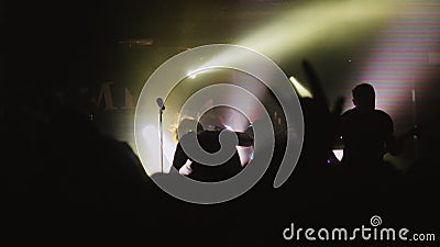 Crowd partying at a concert or a night club. Editorial Stock Photo