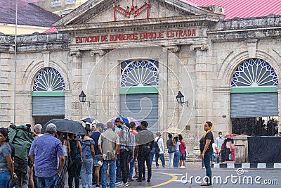 Crowd of people at the funeral honor of fallen firefighters in a supertanker fire in Matanzas, Cuba Editorial Stock Photo