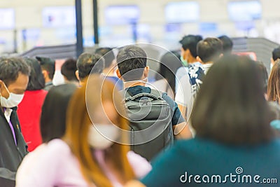 Crowd of people waiting in airport Editorial Stock Photo