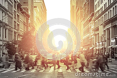 Crowd of people in motion across a busy sidewalk in Manhattan New York City Stock Photo