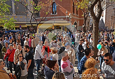 Crowd of people on Plaza del Mercado in Valencia Editorial Stock Photo