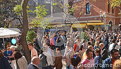 Crowd of people on Plaza del Mercado in Valencia Editorial Stock Photo