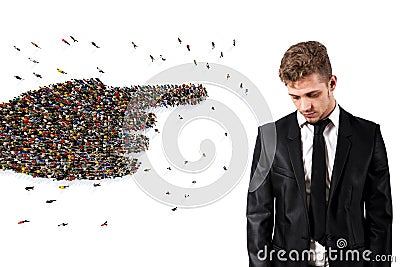 Crowd of people united forming a hand pointing a sad man. 3D Rendering Stock Photo