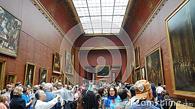 Crowd of people visiting Lourve Editorial Stock Photo