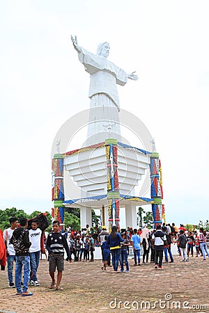 Crowd of pilgrims by memorial on Mansinam island - Jesus Editorial Stock Photo