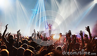 crowd with raised hands at concert festival banner Editorial Stock Photo