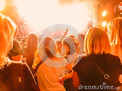 Crowd raising their hands and enjoying great festival party or concert. Editorial Stock Photo