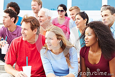 Crowd Of Spectators Watching Outdoor Sports Event Stock Photo