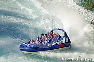 Crowd tourists experiencing best of New Zealand in scenic Waikato River Editorial Stock Photo