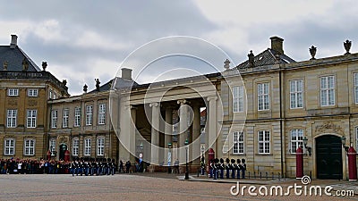 Crowd of tourists observing the daily change of guards of the Royal Life Guards of Denmark (Den Kongelige Livgarde). Editorial Stock Photo