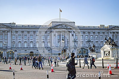 Crowd of tourists outside the famous Buckingham Palace in London Editorial Stock Photo