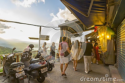 Crowd of tourists sightseeing at Jiufen Old Street looking out the mountain in New Taipei City, Taiwan Editorial Stock Photo