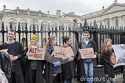 Crowd of University students seen at a peaceful protest, while holding protest signs. Editorial Stock Photo