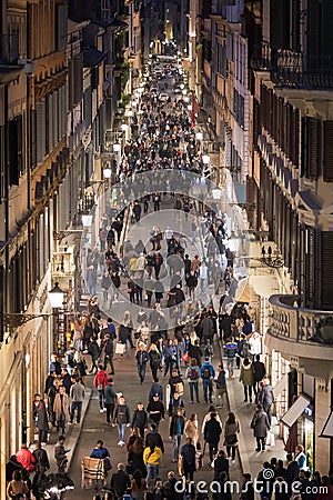 Crowd in Via Condotti in Rome, Italy. The street of the windows of luxury shops Editorial Stock Photo