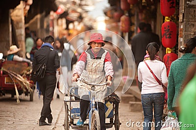 Crowd walking in Shuhe ancient town. Editorial Stock Photo