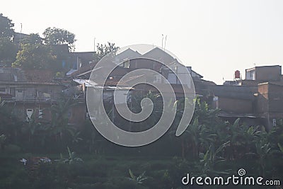 crowded houses between hillsides in lembang early morning Editorial Stock Photo