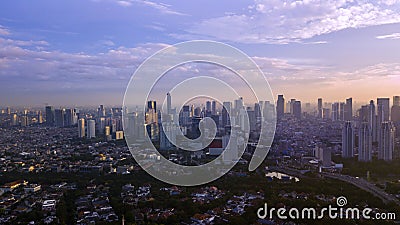 Crowded residential with skyscrapers at nightfall Stock Photo