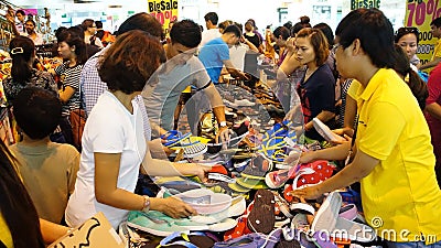 Crowded shoping centre, sale off season Editorial Stock Photo