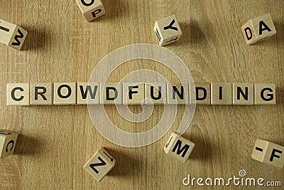 Crowdfunding word from wooden blocks Stock Photo