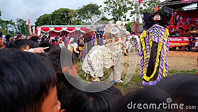Crowds of children crammed to see the barongsai and reog performances Editorial Stock Photo