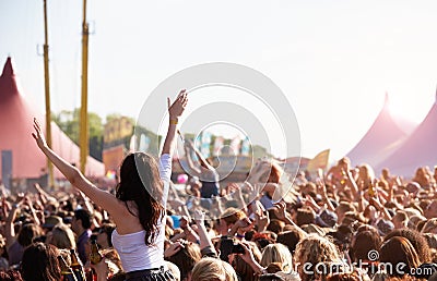 Crowds Enjoying Themselves At Outdoor Music Festival Editorial Stock Photo