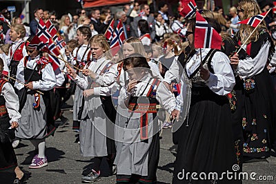 Crowds lining the street for the Children`s parade on Norway`s National Day, 17th of May Editorial Stock Photo