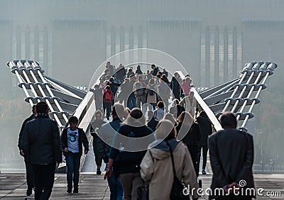 Crowds on Millennium Bridge, London Editorial Stock Photo