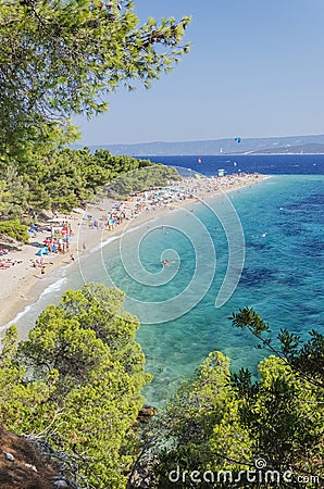 Crowds of people on Golden Cape beach. Golden Cape is the most famous beach in Croatia located on Brac island. Editorial Stock Photo