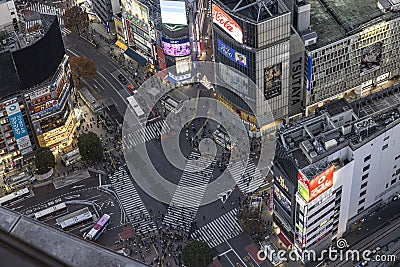 crowds of people prepare to cross the famous Shibuya Crossing aerial view Editorial Stock Photo