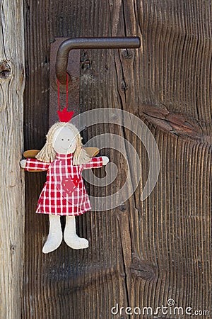 Crown angel hanging on door handle for christmas decoration with Stock Photo