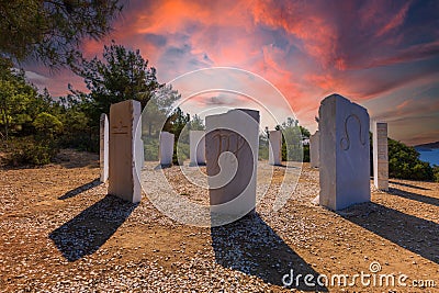 Crown in Limenaria - 12 white stones carved with the signs of the zodiac, set in a circle according to the seasons on a hill above Editorial Stock Photo