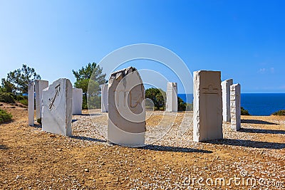 Crown in Limenaria - 12 white stones carved with the signs of the zodiac, set in a circle according to the seasons on a hill above Editorial Stock Photo