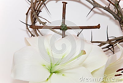 Crown of Thorns, crucifix and white Lily Stock Photo