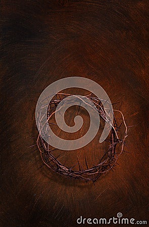 Crown of thorns on a dark red brown painted texture background Stock Photo