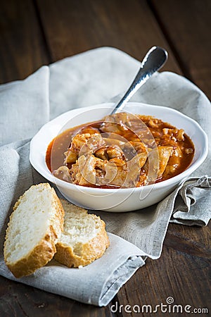 Crubeens with tomato sauce and bread Stock Photo