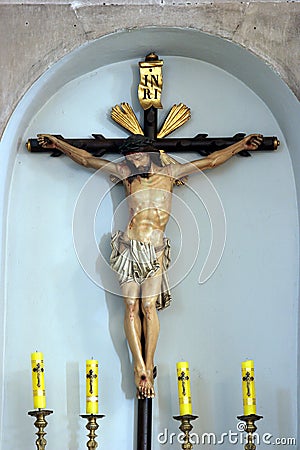 Crucifix, altar of the Holy Cross in the Saint Joseph church in Vela Luka, Croatia Stock Photo