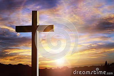 Cross at sunset, crucifixion of Jesus Christ Stock Photo