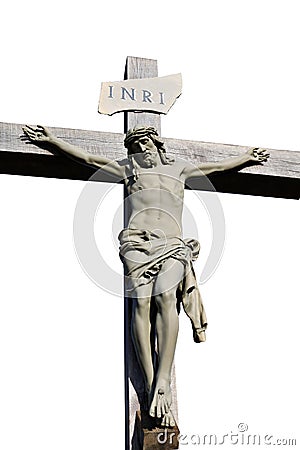 Crucifix in grey cement on white background Stock Photo