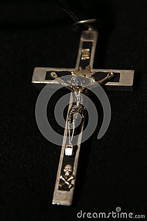 Crucifix with Jesus and Skull and Crossbones Stock Photo