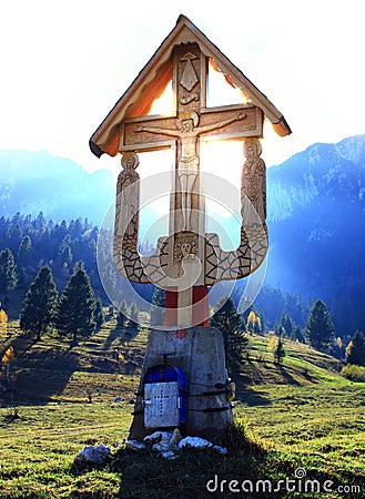 Crucifix in the middle of the mountains Stock Photo