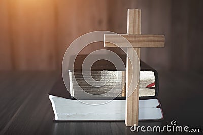 The crucifix is placed in the middle of the Bible. The idea of asking blessings from God with the power and power of holiness, Stock Photo