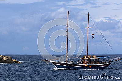 Cruise boat returning after trip Editorial Stock Photo